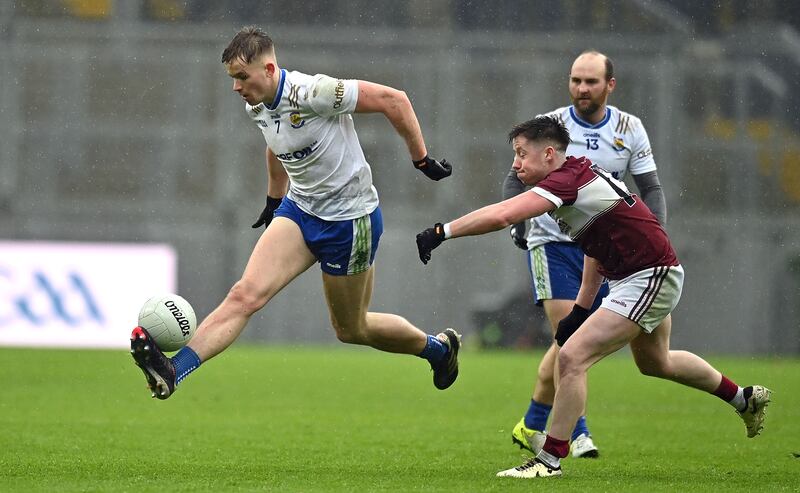 Ruairi Forbes of Ballinderry solos the ball against Crossmolina at Croke Park.