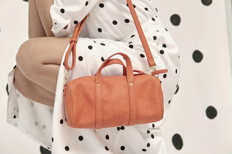 Georgina Duffle Crossbody Bag, &pound;42; Polka Dot Black &amp; White Midi Dress &pound;75, Oliver Bonas 