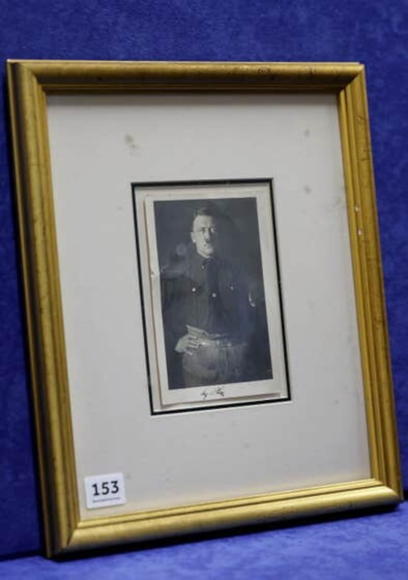 A signed portrait of Nazi leader Adolf Hitler sold for £6,200 in Belfast on Tuesday. (Bloomfield Auctions/PressEye/PA)