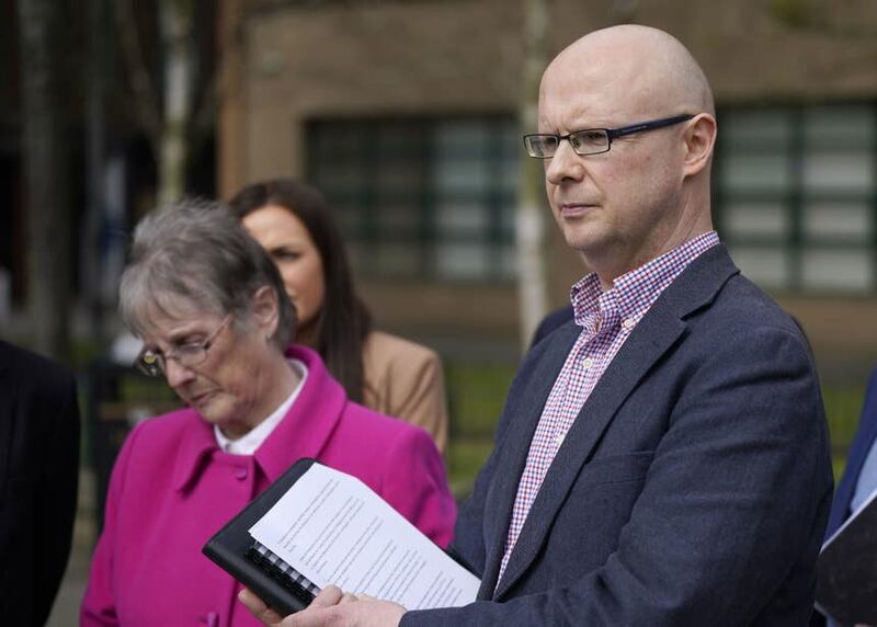 Patsy Kelly’s widow Teresa and son Patsy Kelly junior speaking outside the Police Ombudsman Office in Belfast about the report into the murder of nationalist councillor Patsy Kelly in Co Tyrone in 1974 (Niall Carson/PA)