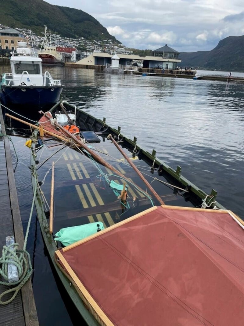 The Viking ship replica moored at the quay in Maloy after capsizing earlier this week off Norway’s coast (Norwegian Police via AP)