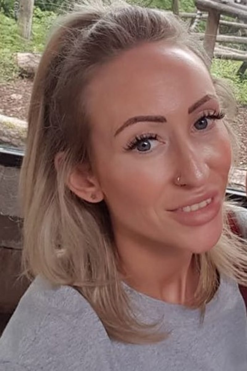 Kathryn Parton, known as Kat, 34, was found dead with head injuries in a house in the Madrid Street area of east Belfast