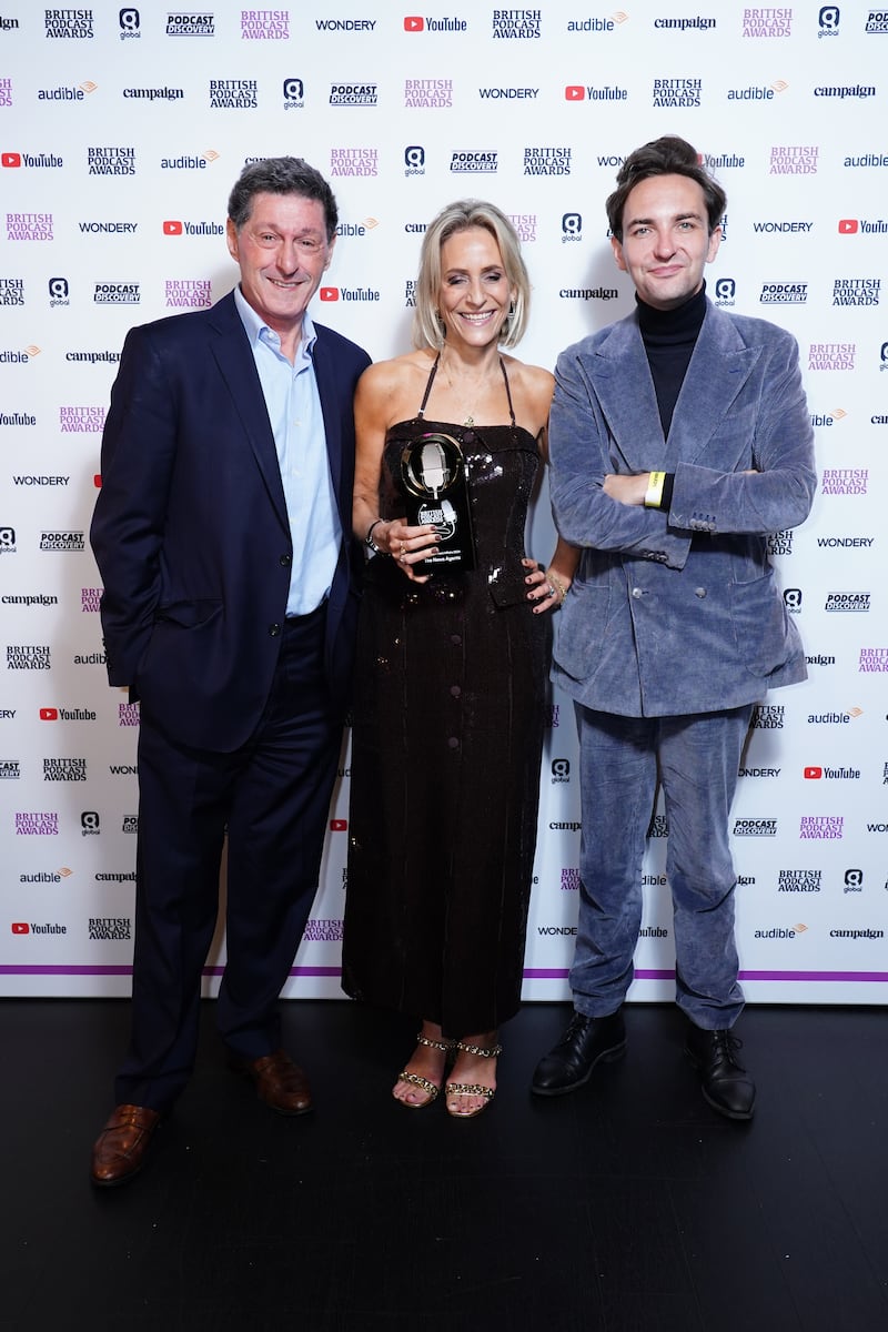 Lewis Goodall, Jon Sopel, and Emily Maitlis holding the best news & current affairs podcast award for their podcast The News Agents