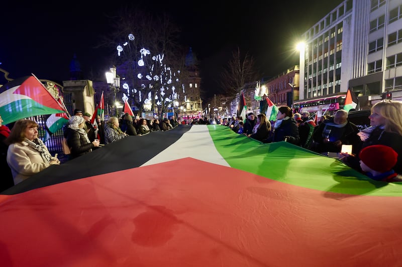 A vigil for Palestine on New Years Eve outside Belfast City Hall.PICTURE: COLM LENAGHAN