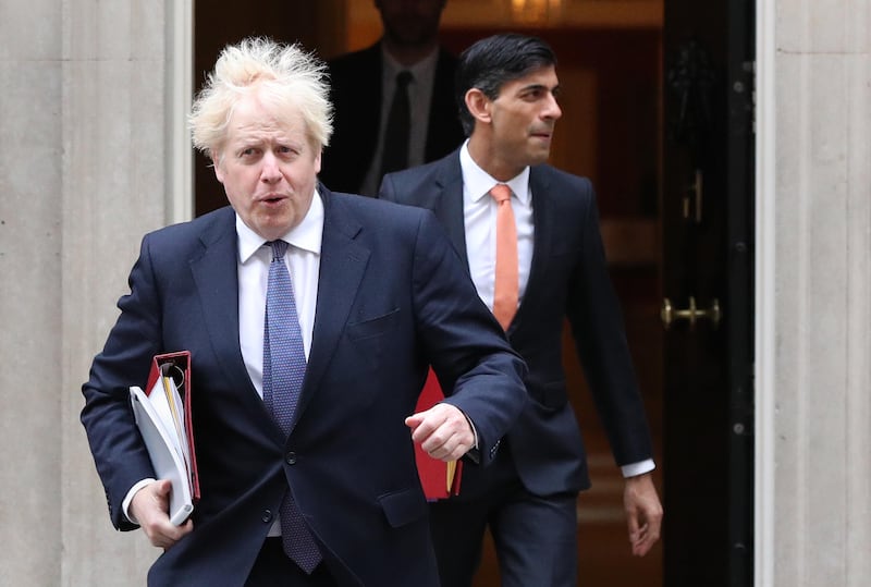 Boris Johnson (left) and Rishi Sunak leave 10 Downing Street in 2020 when they were prime minister and chancellor, respectively
