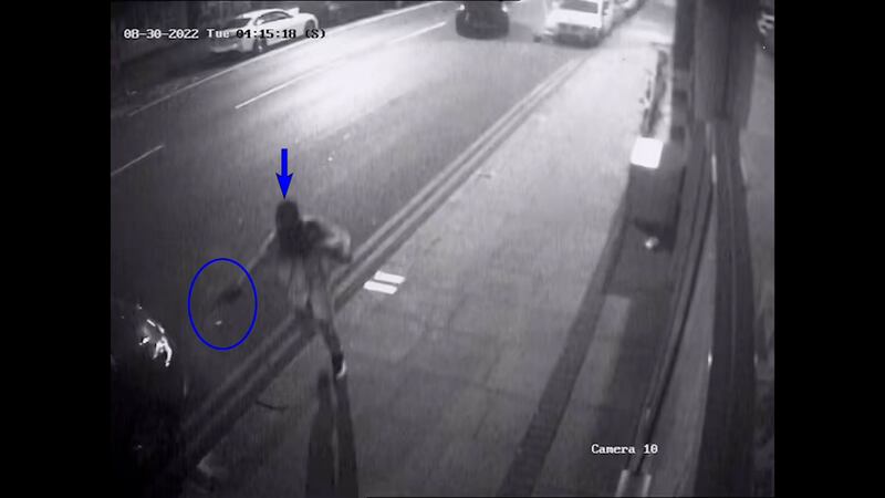 A CCTV still shows a masked gunman said to be Chris Kaba taking aim at a rival outside a nightclub in Hackney on August 30, 2022.