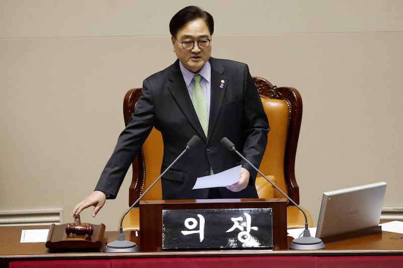 South Korean National Assembly Speaker Woo Won Shik urged ruling party members to vote (AP)