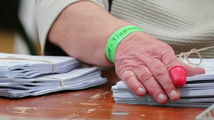 Ballot papers are sorted and verified (Peter Byrne/PA)