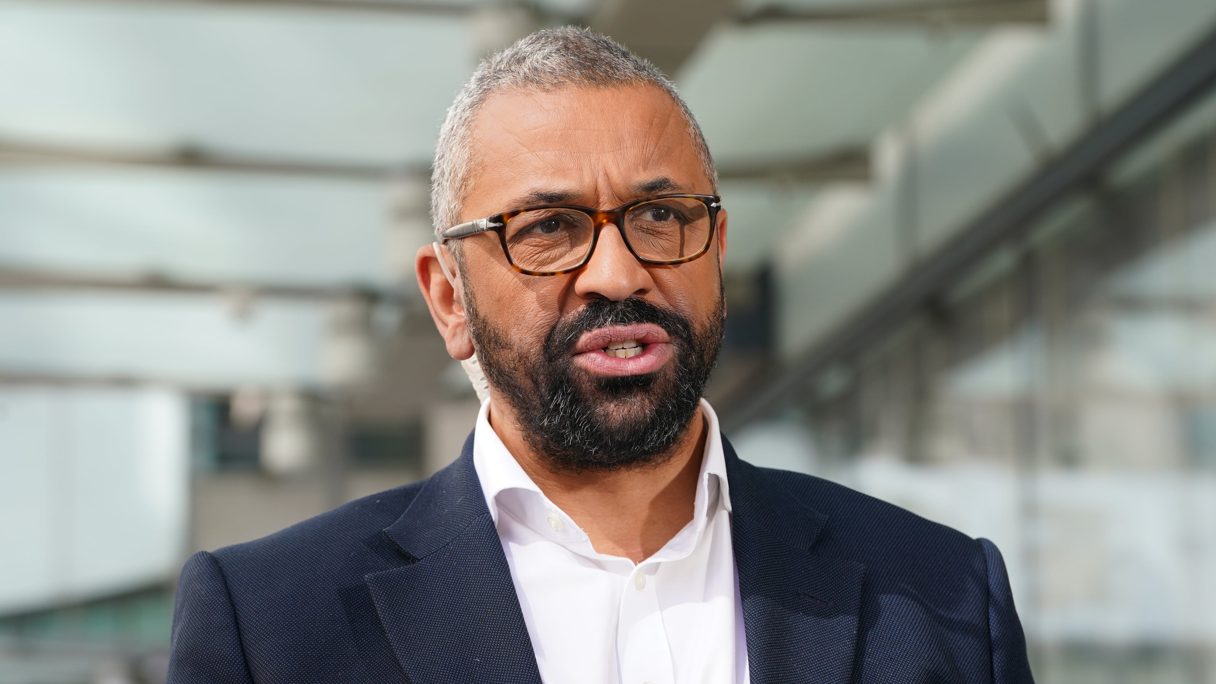 Home Secretary James Cleverly speaking to the media outside BBC Broadcasting House after appearing on Sunday with Laura Kuenssberg