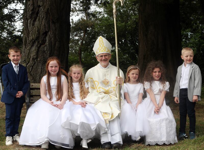 Children from St Patrick's primary school, Saul – Cormac Hanna, Issabelle Farrell, Darcie Mullen, Maria Byrne and Harry McMullan – and Lucia Rose Smyth from St Caolan's primary school, Darragh Cross, following the celebration of Mass on St Patrick's Mountain