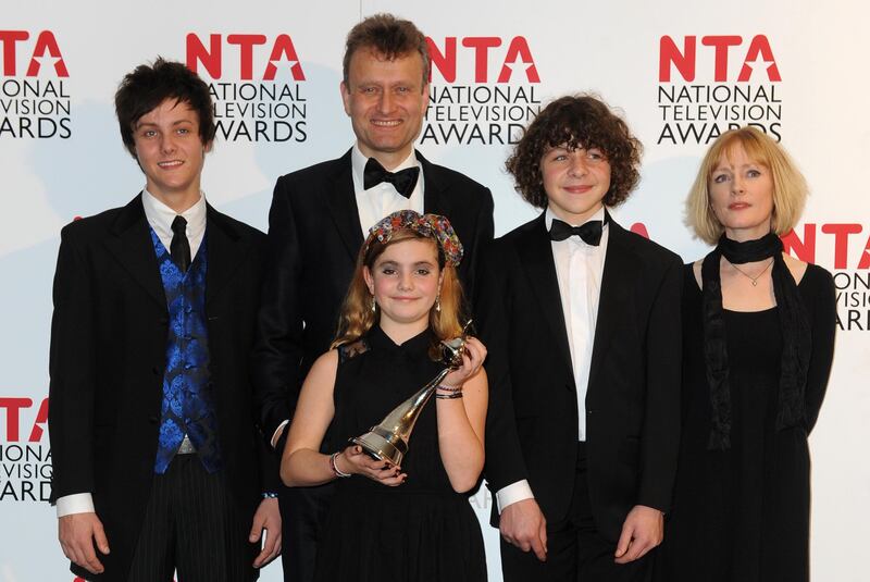 The cast of Outnumbered Tyger Drew-Honey, Hugh Dennis, Ramona Marquez, Daniel Roche and Claire Skinner with their NTA award