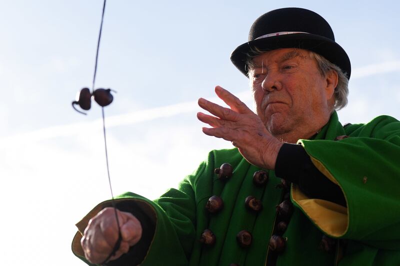 David Jakins, who is also known as King Conker, taking part in the annual World Conker Championships