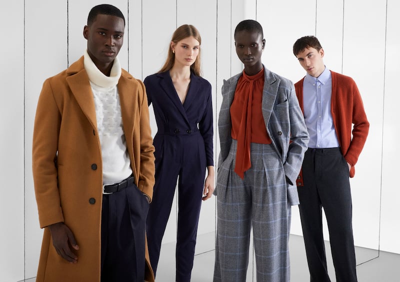 Models showcasing the Modern Artisan luxury capsule collection in 2020, including a navy jumpsuit worn by Sienna Miller at the carol concert