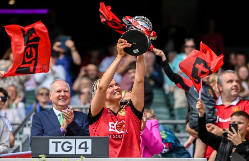 Down Ladies captain Meghan Doherty lifts the All-Ireland Junior Championship trophy at Croke Park.