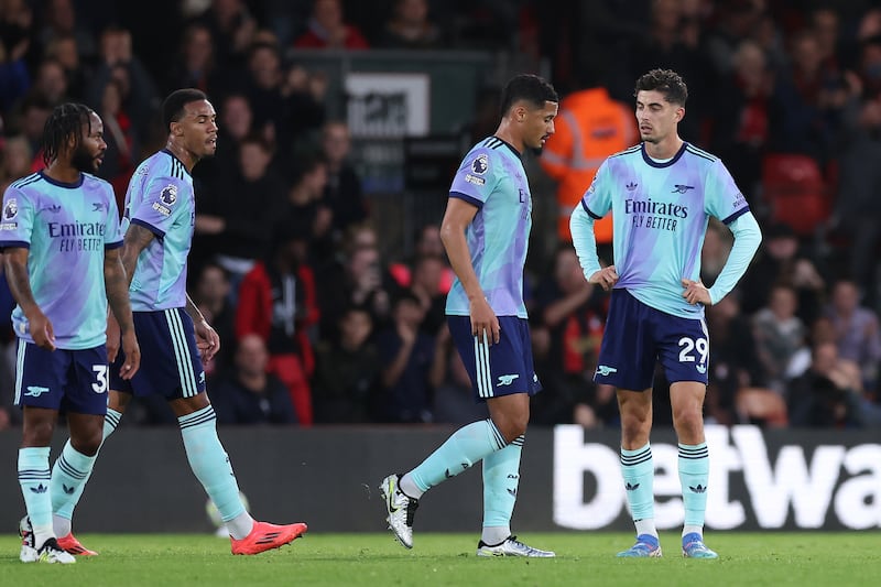 William Saliba (centre right) was sent off against Bournemouth