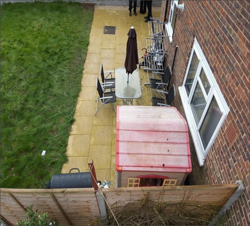 The rear garden of the family house on Hammond Road in Woking, Surrey, where the body of 10-year-old Sara Sharif was found under a blanket in a bunk bed