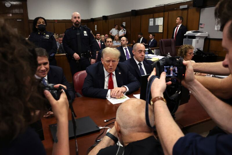 Donald Trump appears at Manhattan Criminal Court before closing arguments in his criminal hush money trial in New York (Spencer Platt/Pool Photo via AP)