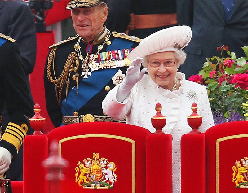 Queen Elizabeth II and the late Prince Philip, Duke of Edinburgh during the Diamond Jubilee Pageant in 2012