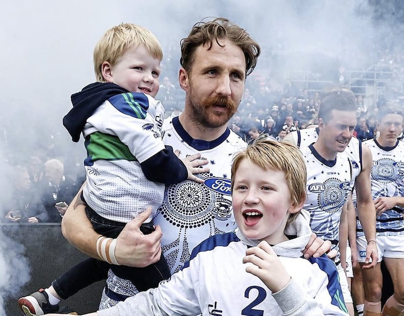 Zach Tuohy takes the field for his 256th game in the AFL, a record for an Irish player in the league, surpassing the mark set by the late Jim Stynes Picture: Geelong Cats Twitter 