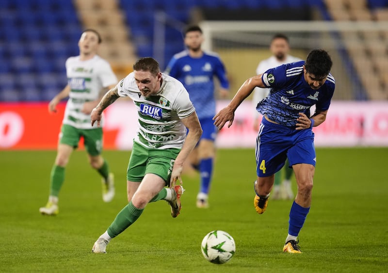 Declan McManus runs for the ball