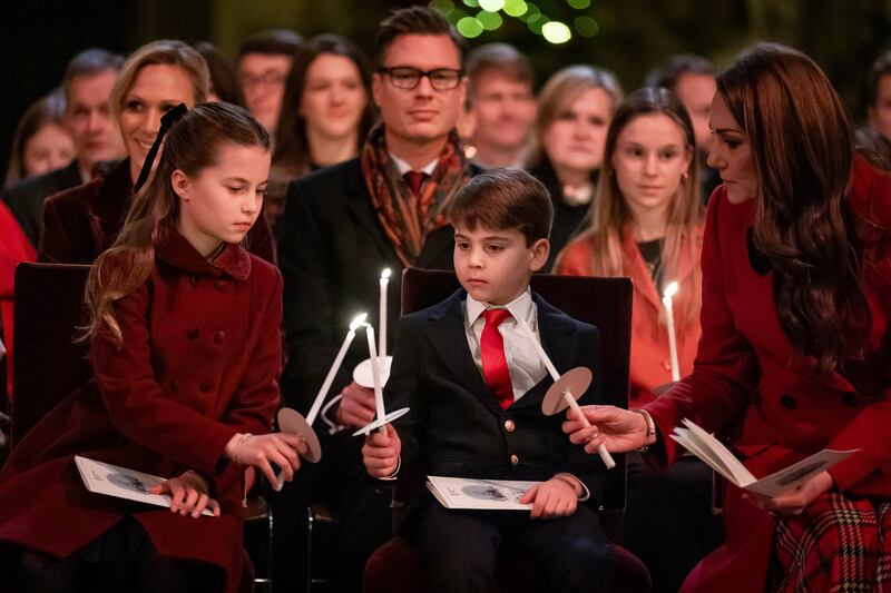 Princess Charlotte, Prince Louis and the Princess of Wales during the Together At Christmas carol service at Westminster Abbey