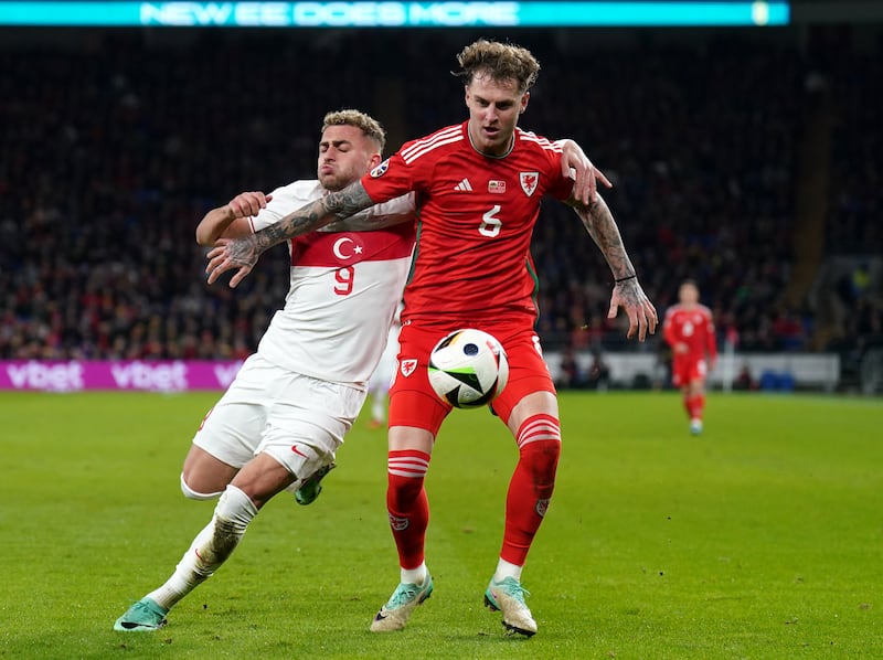 Joe Rodon (right) is in line to win his 50th cap for Wales against Iceland on Tuesday