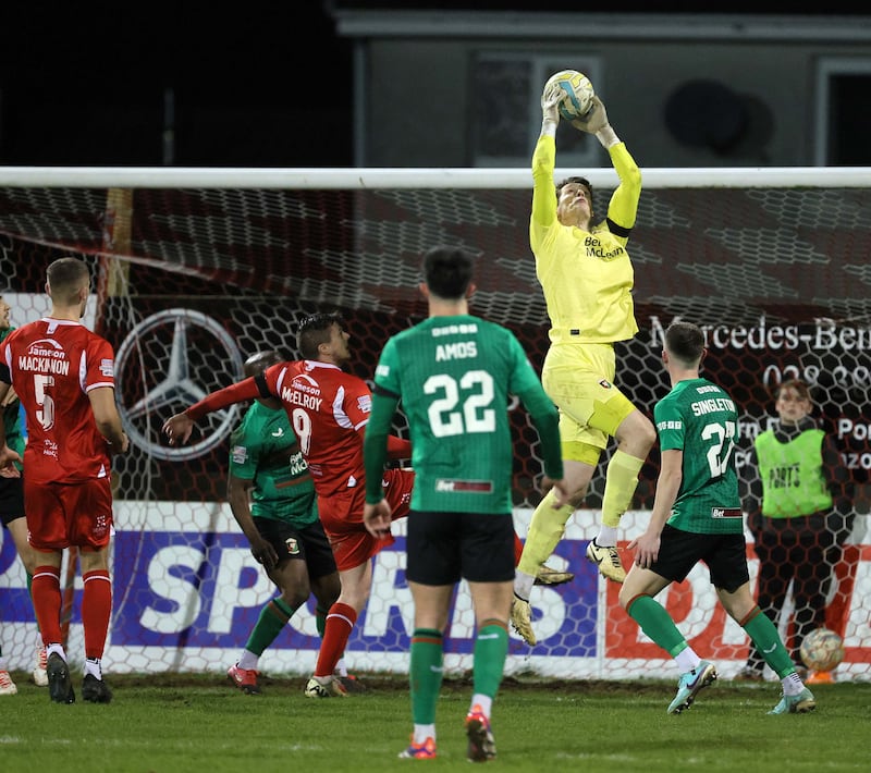 Pacemaker Press 30-12-24
Portadown v Glentoran - Sports Direct Premiership
Glentoran's Andrew Mills claims the ball  during this evening's game at Shamrock Park, Portadown.  Photo by David Maginnis/Pacemaker Press