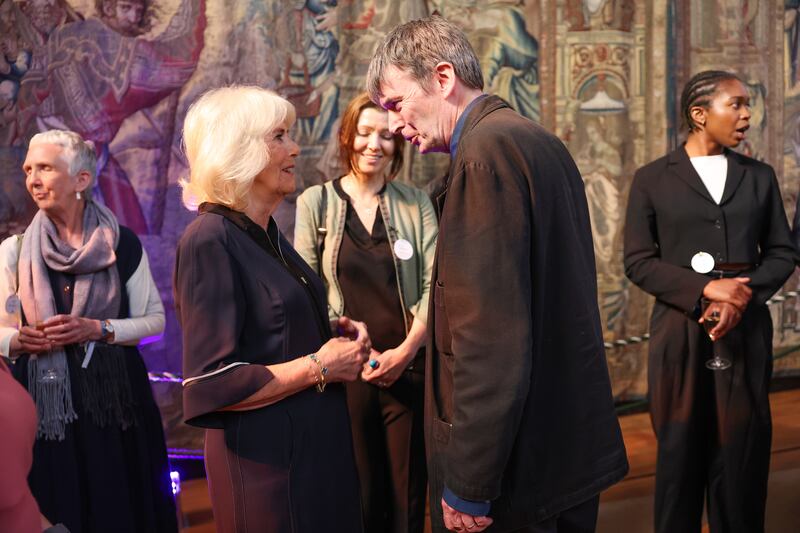 Camilla speaks to Sir Ian Rankin during a reception with authors, actors and lovers of literature attending the Queen’s Reading Room Literary Festival at Hampton Court Palace in June