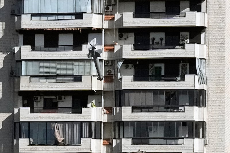 An Associated Press photographer was able to capture the missile as it struck the building (Bilal Hussein/AP)