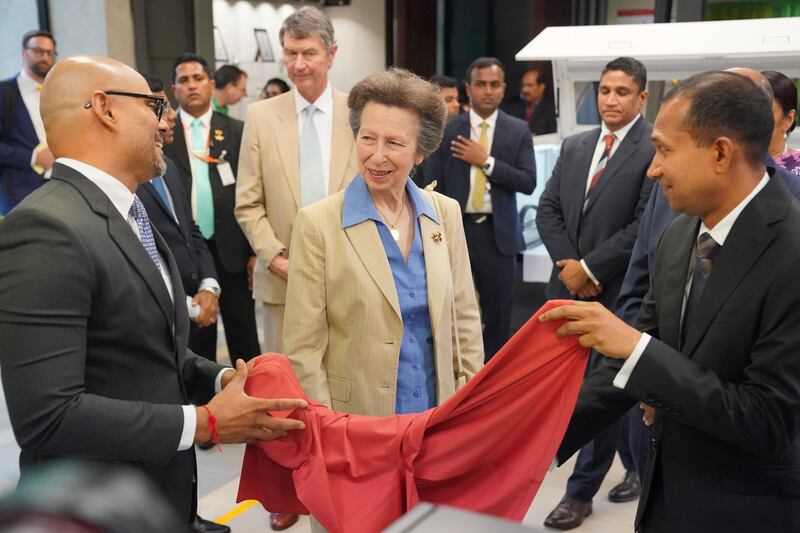 The Princess Royal is shown fabrics during her visit to the MAS factory in Colombo