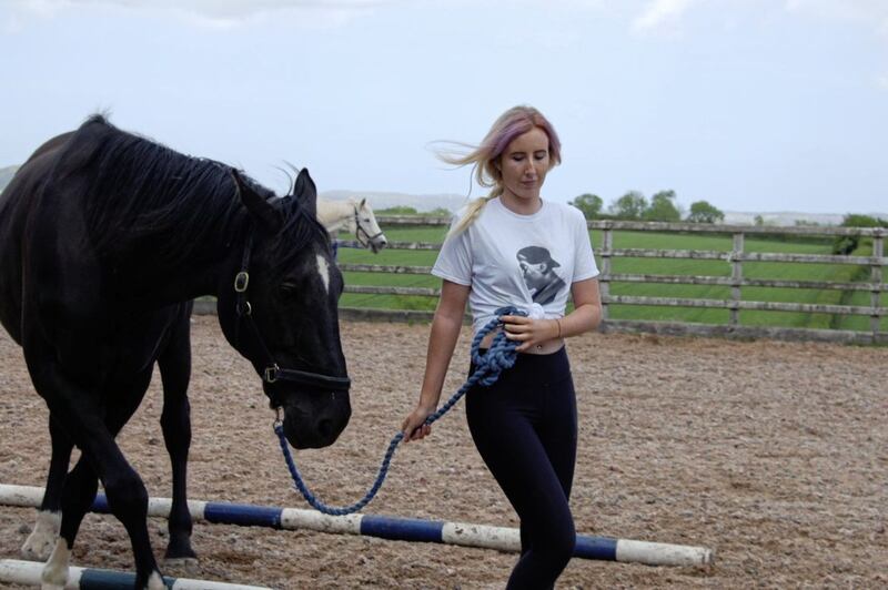 Care worker Shannon Templeton at June's Ballygraffan farm, overlooking Strangford Lough