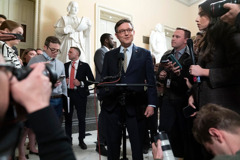 Speaker of the House Mike Johnson talks to reporters after the House approved the funding bill (Jose Luis Magana/AP)