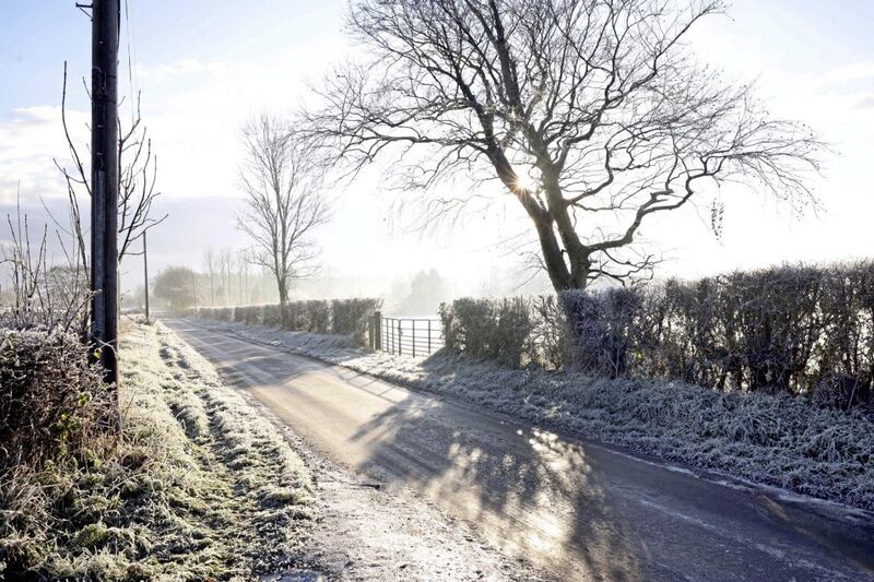 Navigating rural roads like this one in Co Antrim is proving treacherous in the mornings. Picture by Stephen Davison/Pacemaker  