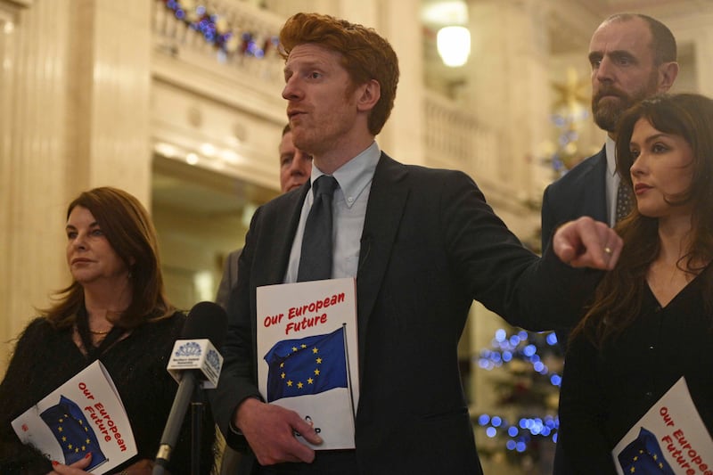 SDLP leader of the Opposition Matthew O’Toole speaks to reporters in the Great Hall of Parliament Buildings ahead of the debate