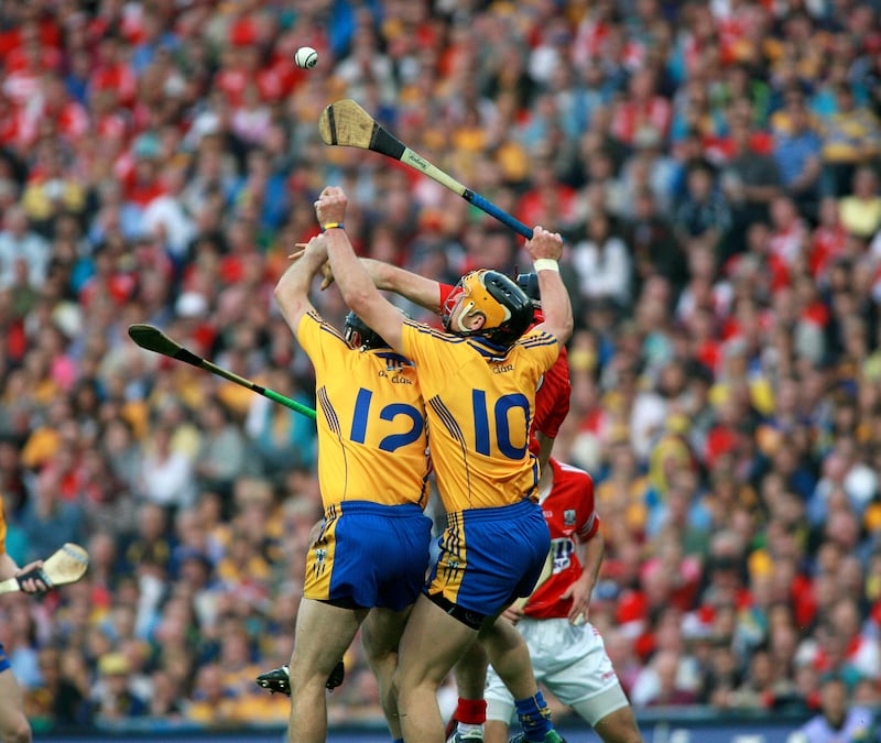 Clare's Colin Ryan and John Conlon compete against Cork's Daniel Kearney in the 2013 All-Ireland final. Picture: Seamus Loughran