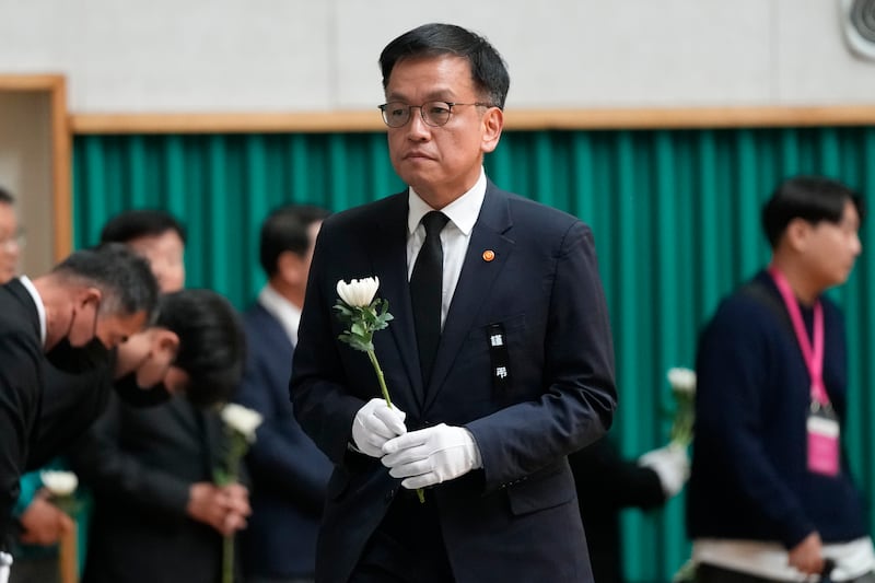 South Korea’s acting president Choi Sang-mok arrives to pray for the victims of the plane crash (Ahn Young-joon/AP)