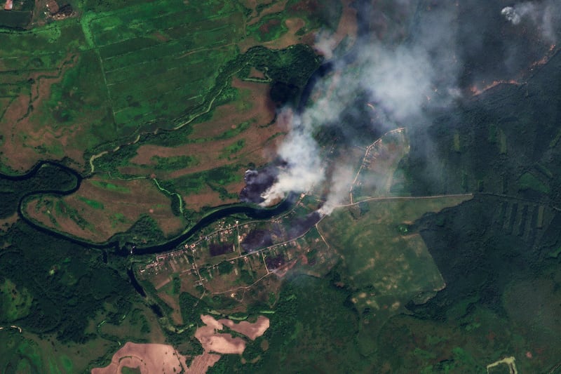 This satellite image released by Planet Labs PBC shows fires near the village of Krasnooktyabrskoe in Russia’s Kursk region (Planet Labs PBC via AP)