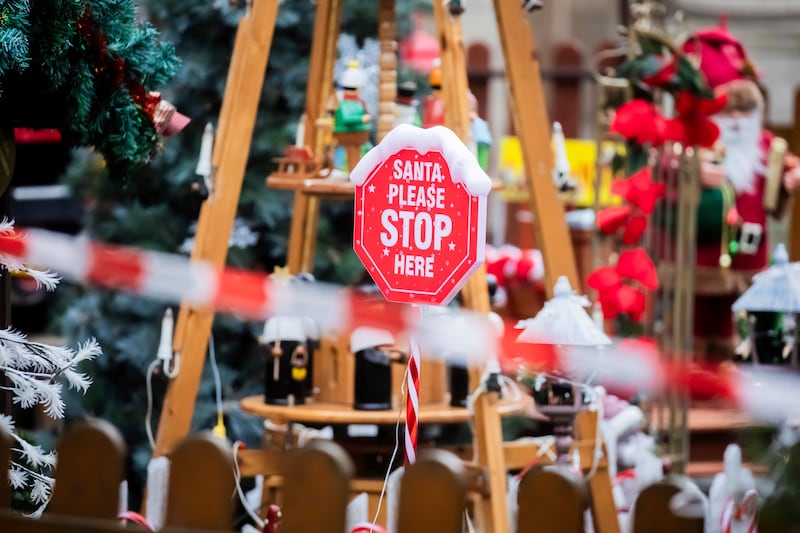 ‘Santa please stop here’ is written on a sign behind a police cordon at the Christmas market in Magdeburg (Christoph Soeder/dpa via AP)