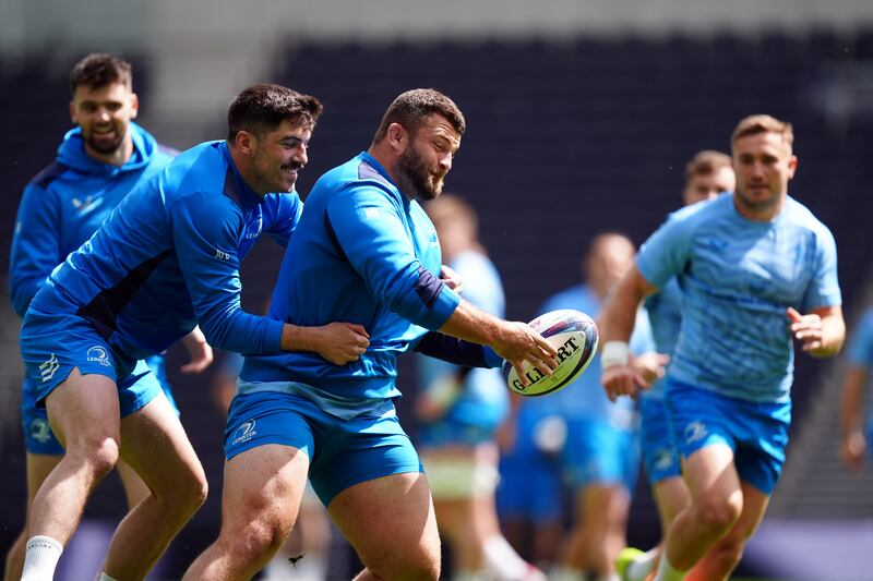 Leinster’s Michael Milne is tackled by Jimmy O’Brien during the captains run at Tottenham Hotspur Stadium ahead of the Champions Cup final