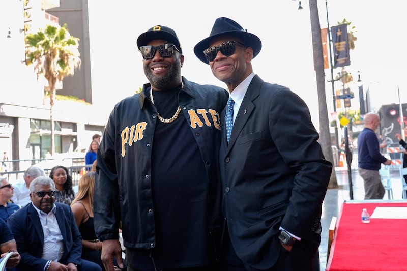 Killer Mike, left, and Jimmy Jam attend a ceremony honouring Otis Redding with a star on the Hollywood Walk of Fame (Chris Pizzello/AP)