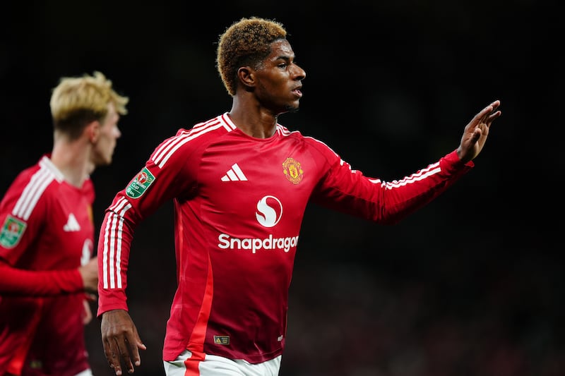 Marcus Rashford celebrates after opening the scoring against Barnsley