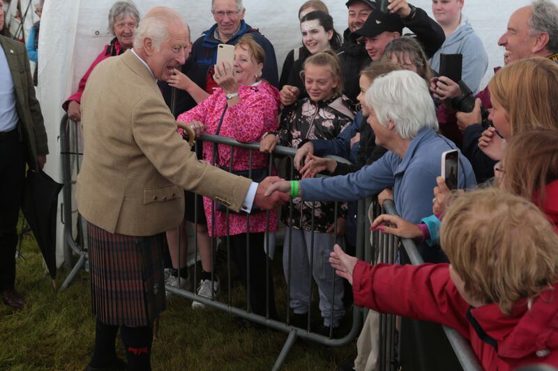 The King greeted well-wishers on his visit