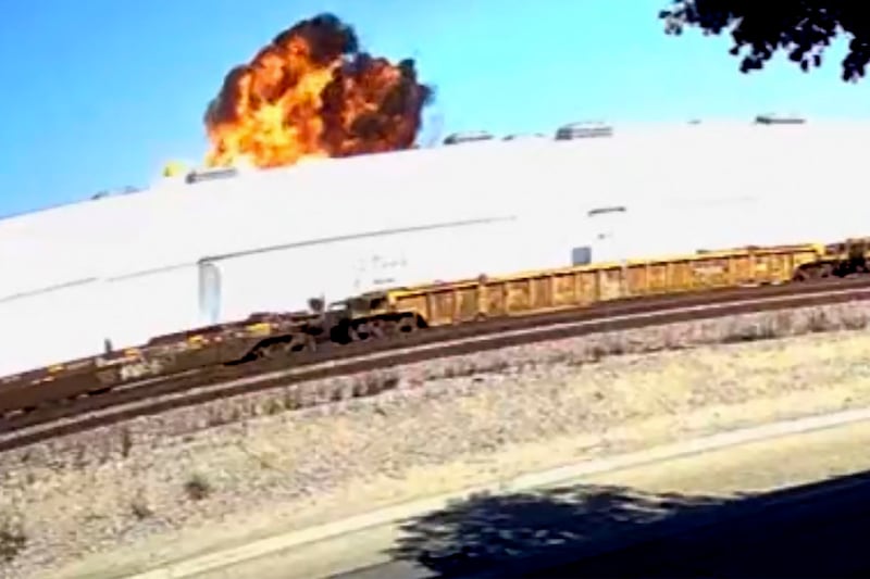 This image taken from video footage, shows an explosive fire as a small plane crashes into a commercial building in Fullerton (Rucci Forged/AP)