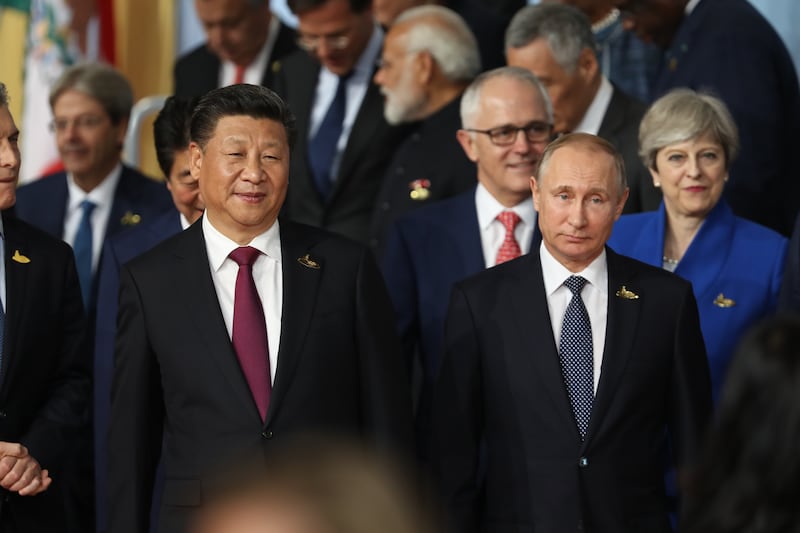 Sir Keir told Chinese President Xi Jinping, left, that he hopes they can have open, frank and honest discussions on issues such as Hong Kong and Russia’s war in Ukraine