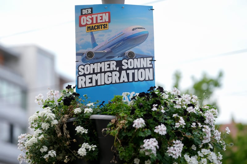 An election campaign poster of the far-right Alternative for Germany (Markus Scheiber/AP)