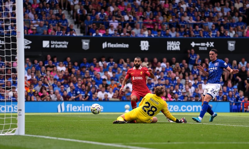 Mohamed Salah, left, beats Ipswich keeper Christian Walton for Liverpool’s second goal