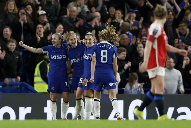 Sjoeke Nusken, second left, celebrates her second goal