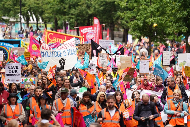 Members of the National Education Union taking part in a rally through Westminster in July 2023