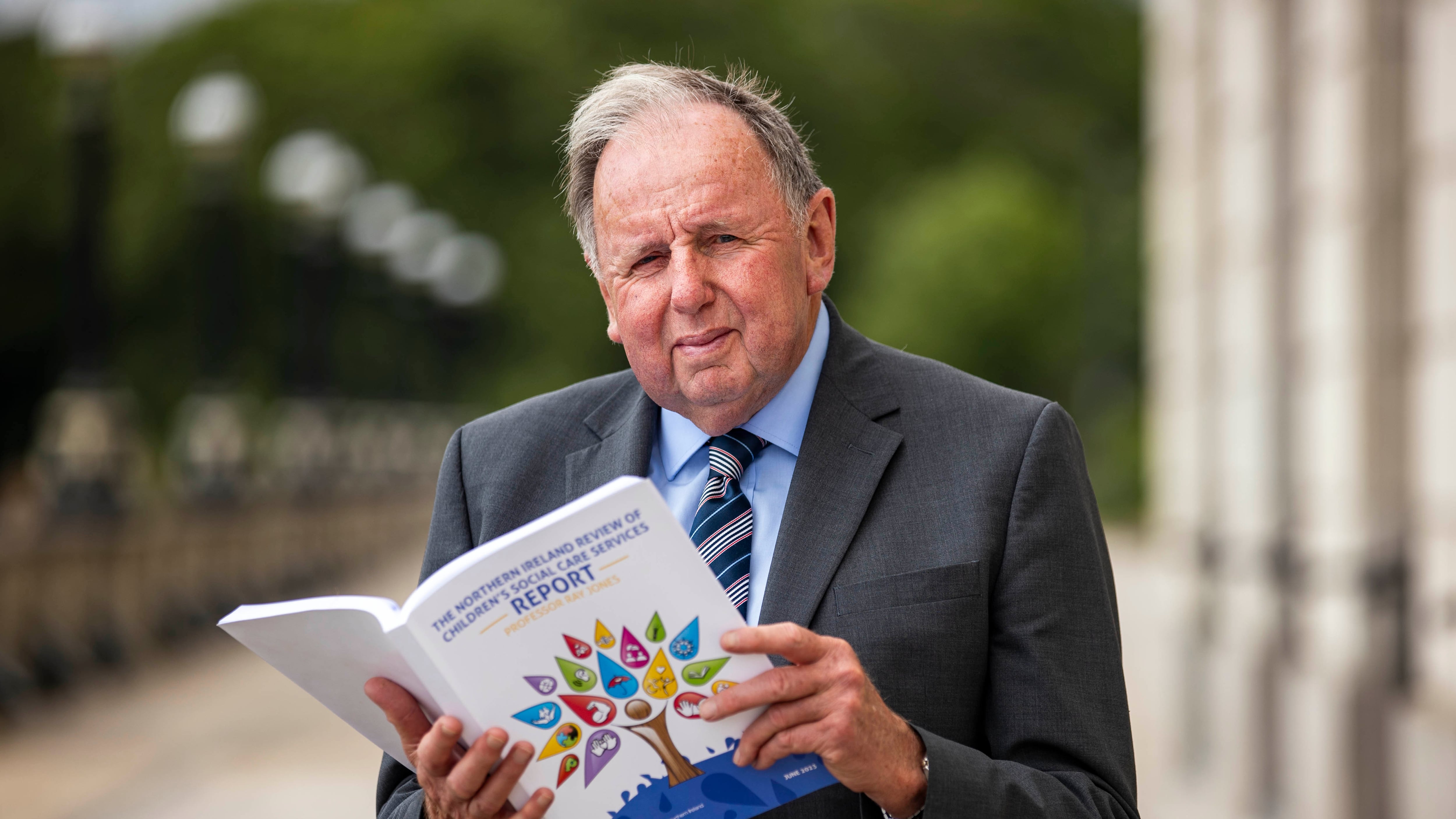 Professor Ray Jones with the Northern Ireland review of children's social care services report at Stormont last June. PICTURE: LIAM MCBURNEY/PA WIRE