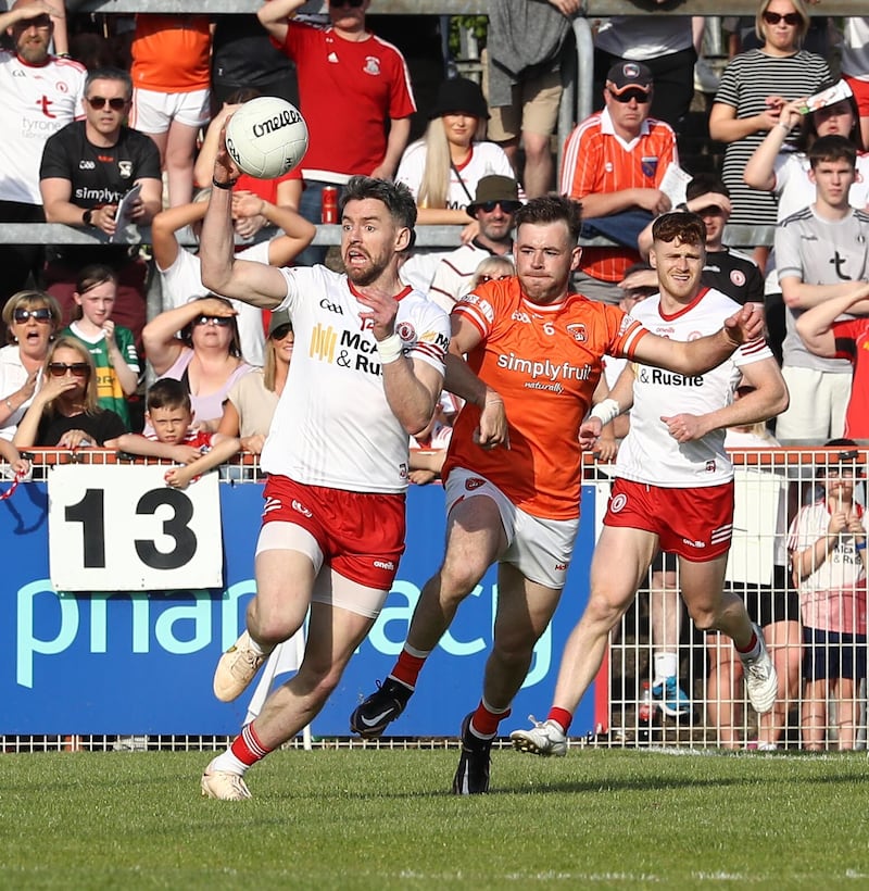 Tyrone's Matthew Donnelly and Armagh's Callum Cumiskey in action during the GAA Football All-Ireland Senior Championship Round Two between Tyrone and Armagh at the O'Neills Healy Park Omagh on 06-03-2023. Picture by Philip Walsh.